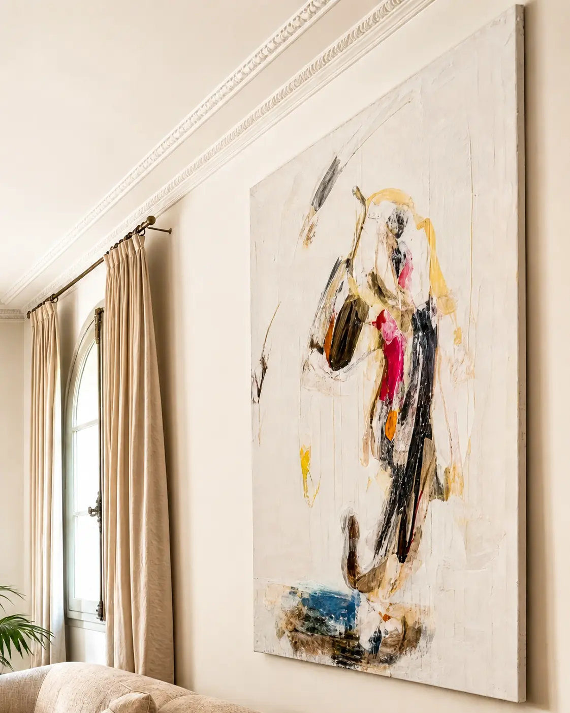 Contemporary artwork in a paneled drawing room